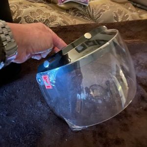 Motorcycle helmut slide-up face shield